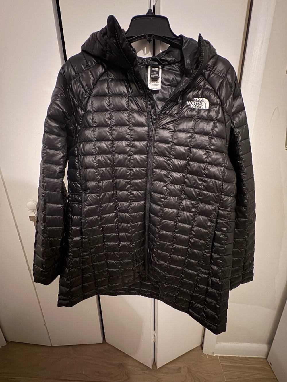 The North Face Women's puffer coat. Black. Size XL
